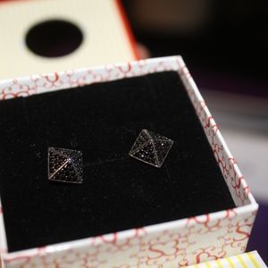 black pyramid earrings